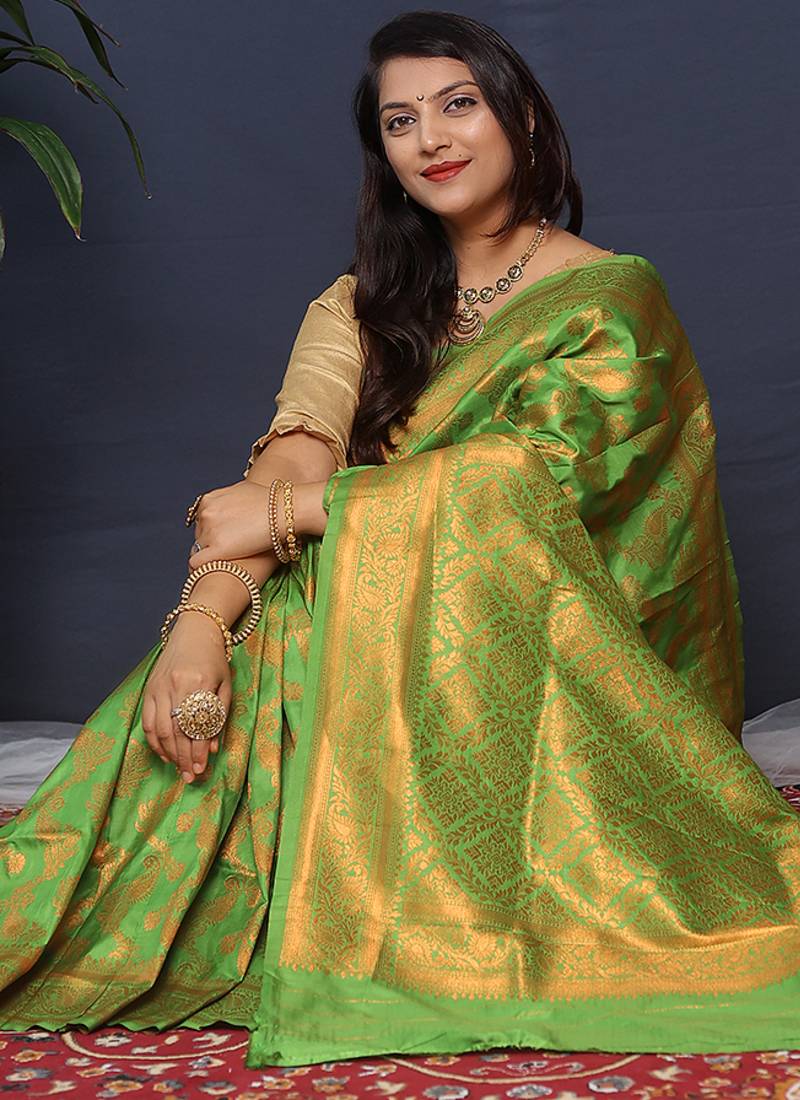 Leaf green kanjeevaram silk blend saree with copper zari floral weaving