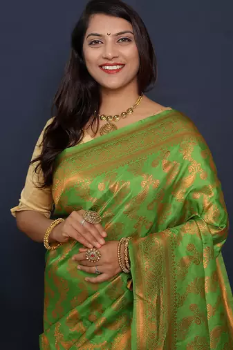 Leaf green kanjeevaram silk blend saree with copper zari floral weaving