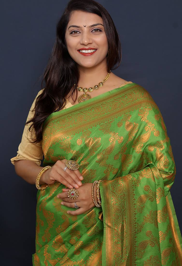 Leaf green kanjeevaram silk blend saree with copper zari floral weaving