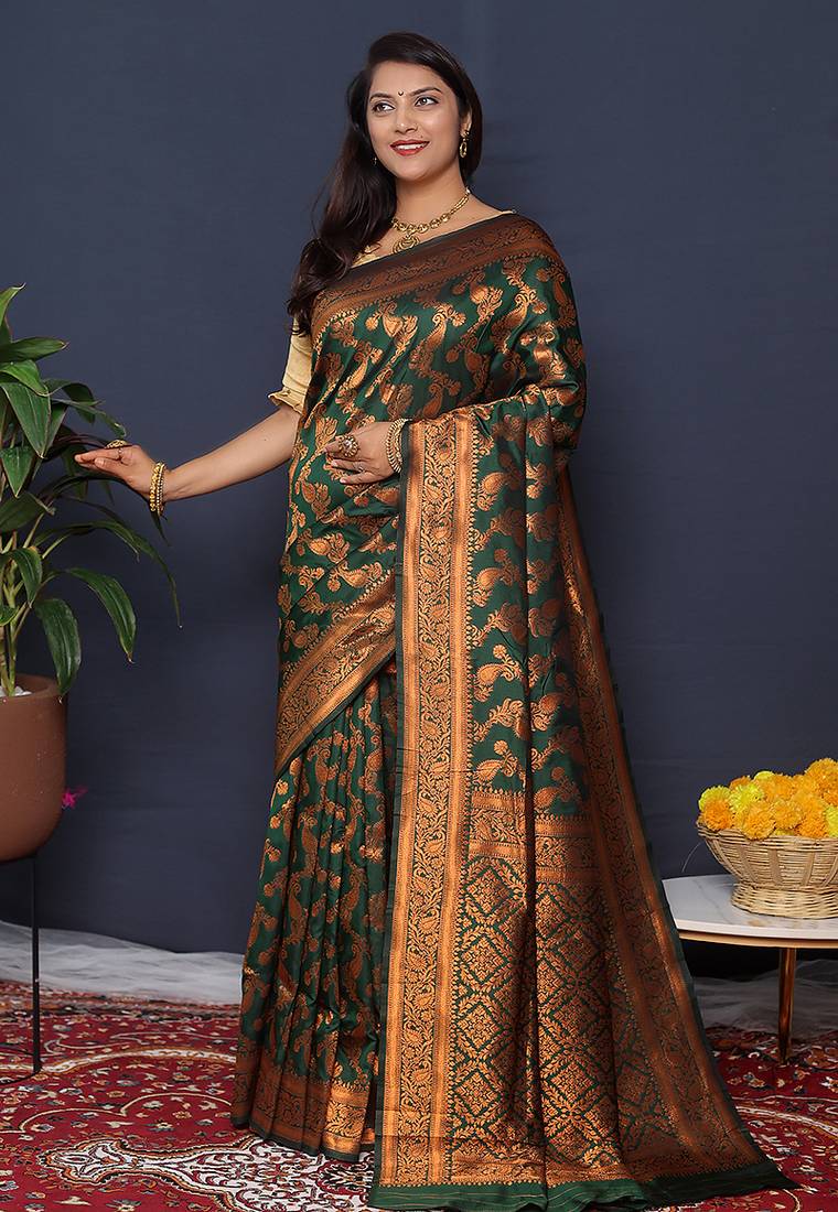 Bottle green kanjeevaram silk blend saree with copper zari floral weaving