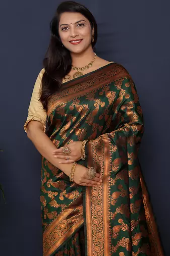 Bottle green kanjeevaram silk blend saree with copper zari floral weaving