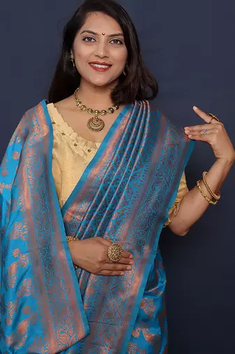 Aqua blue kanjeevaram silk blend saree with copper zari floral weaving