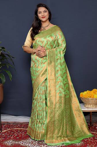 Light green kanjeevaram silk blend saree with copper zari floral weaving