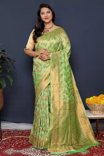 Light green kanjeevaram silk blend saree with copper zari floral weaving