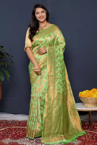 Light green kanjeevaram silk blend saree with copper zari floral weaving