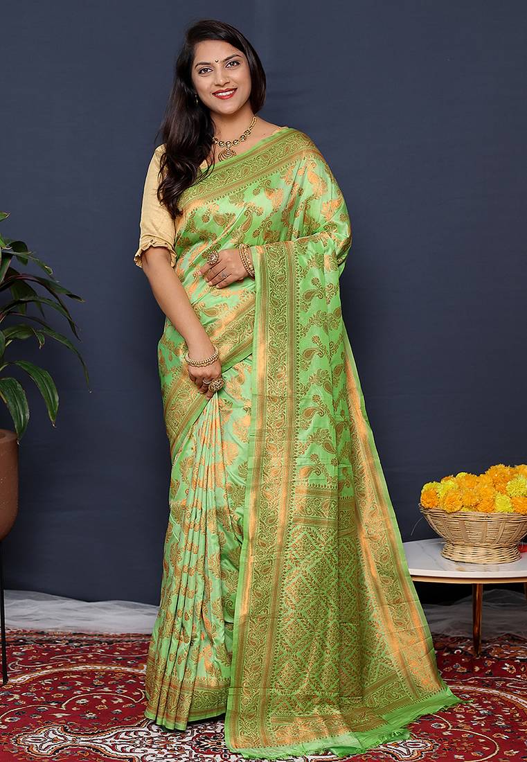 Light green kanjeevaram silk blend saree with copper zari floral weaving