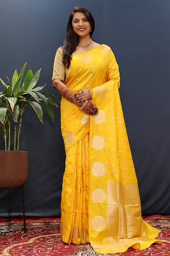 Yellow banarasi silk blend saree with zari buta & rich pallu