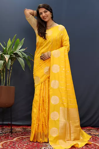 Yellow banarasi silk blend saree with zari buta & rich pallu