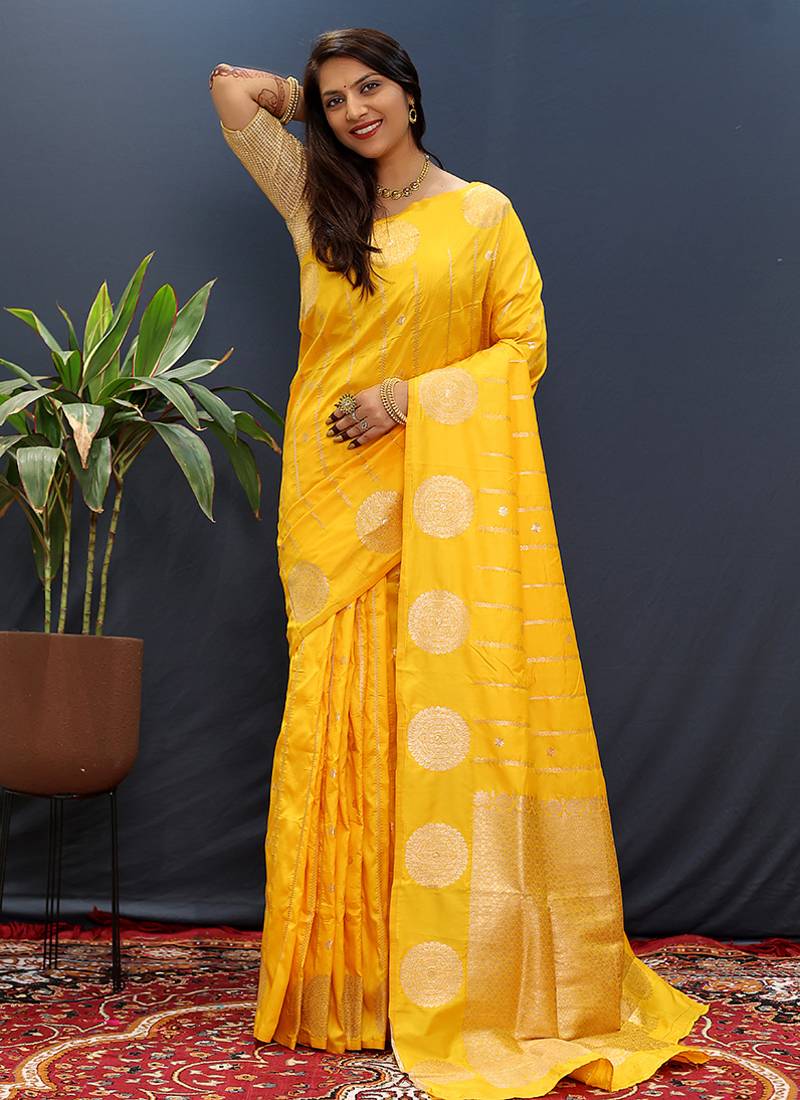 Yellow banarasi silk blend saree with zari buta & rich pallu