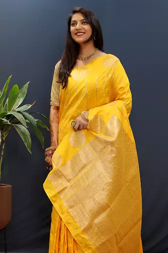 Yellow banarasi silk blend saree with zari buta & rich pallu