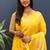 Yellow banarasi silk blend saree with zari buta & rich pallu