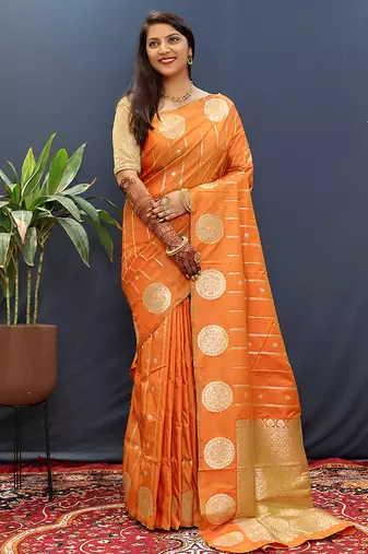 Rust orange banarasi silk blend saree with zari buta & rich pallu
