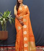 Rust orange banarasi silk blend saree with zari buta & rich pallu