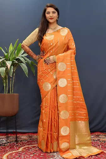 Rust orange banarasi silk blend saree with zari buta & rich pallu