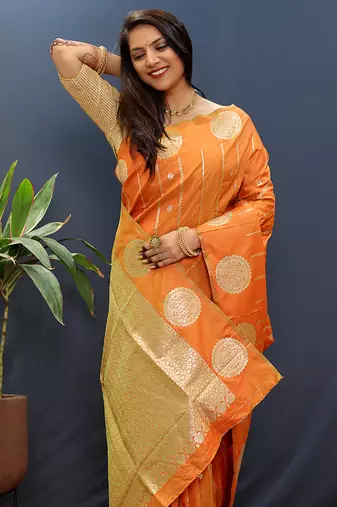 Rust orange banarasi silk blend saree with zari buta & rich pallu