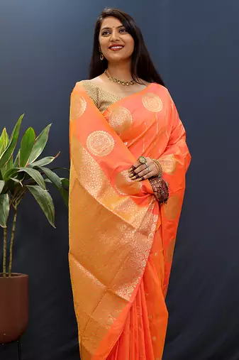 Peach pink banarasi silk blend saree with zari buta & rich pallu