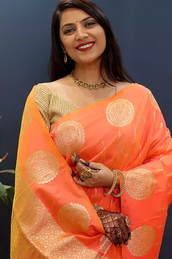 Peach pink banarasi silk blend saree with zari buta & rich pallu