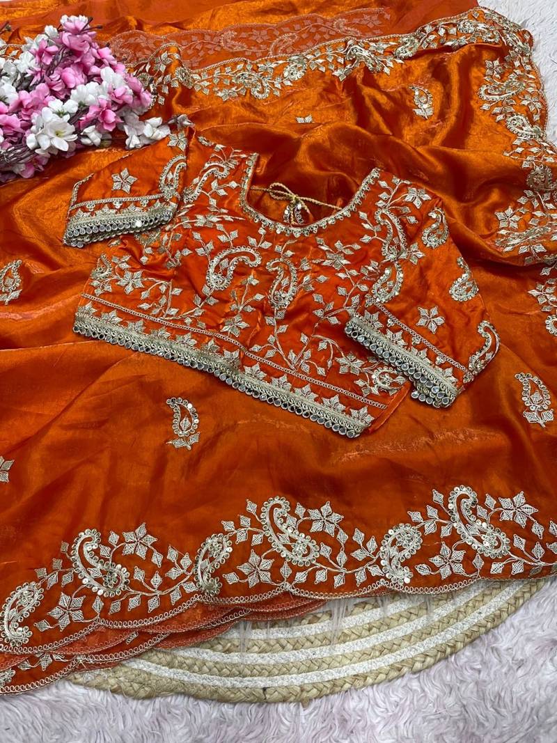 Orange Color sequence And embroidery work Satin Saree