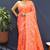 Peach orange banarasi silk blend saree with zari floral weaving