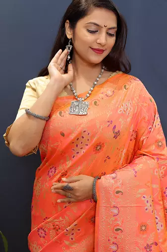 Peach orange banarasi silk blend saree with zari floral weaving