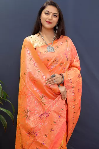 Peach orange banarasi silk blend saree with zari floral weaving