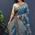 Teal blue banarasi silk blend saree with zari floral weaving