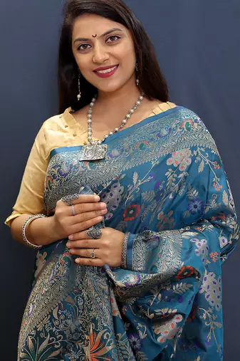 Teal blue banarasi silk blend saree with zari floral weaving