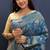 Teal blue banarasi silk blend saree with zari floral weaving