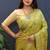 Light green banarasi silk blend saree with zari floral weaving
