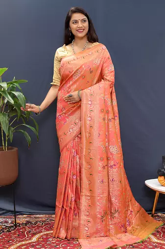 Salmon pink banarasi silk blend saree with zari floral weaving
