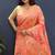 Salmon pink banarasi silk blend saree with zari floral weaving