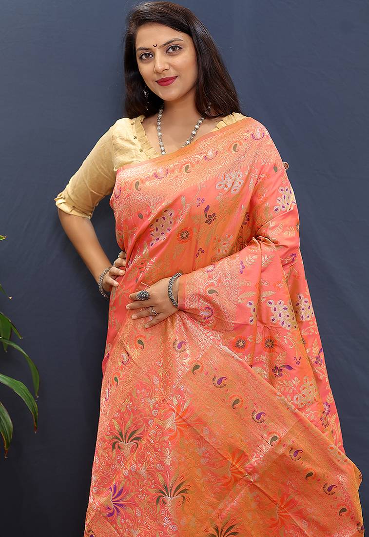 Salmon pink banarasi silk blend saree with zari floral weaving