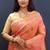Salmon pink banarasi silk blend saree with zari floral weaving