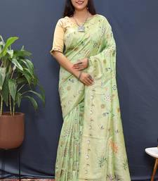 Mint green banarasi silk blend saree with zari floral weaving