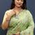 Mint green banarasi silk blend saree with zari floral weaving