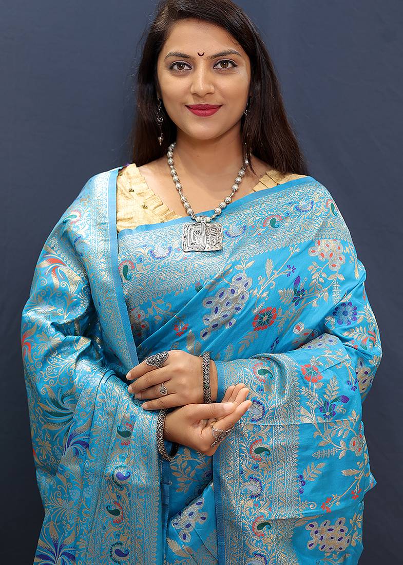 Light blue banarasi silk blend saree with zari floral weaving