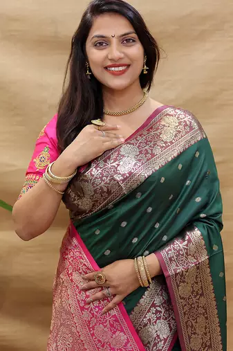 Bottle green banarasi silk blend saree with contrast border & rich zari weaving