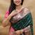 Bottle green banarasi silk blend saree with contrast border & rich zari weaving
