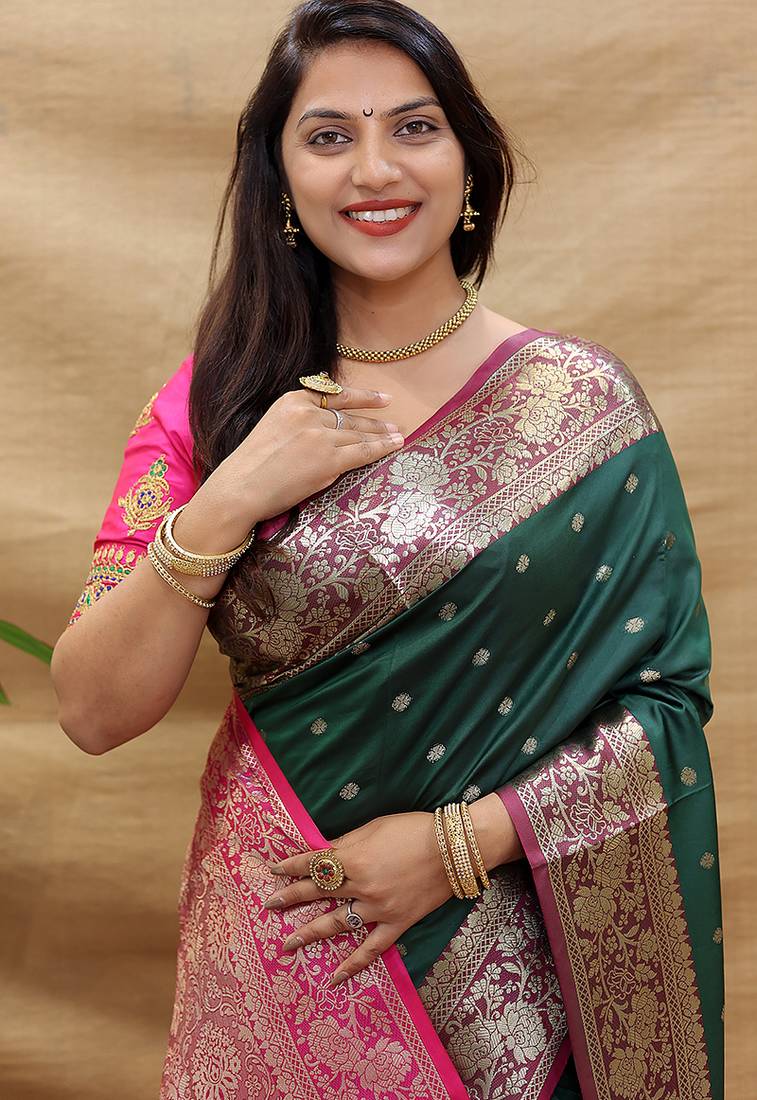 Bottle green banarasi silk blend saree with contrast border & rich zari weaving