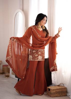 Women's rust orange embroidered kurta set with dupatta 1