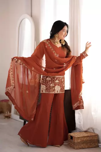 Women's rust orange embroidered kurta set with dupatta