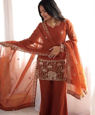 Women's rust orange embroidered kurta set with dupatta 3