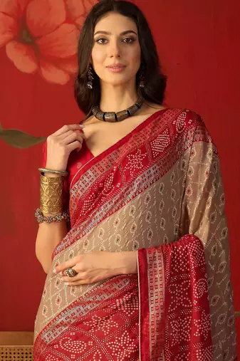 Beige georgette bandhni printed saree with unstitched blouse piece.