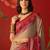 Beige georgette bandhni printed saree with unstitched blouse piece.