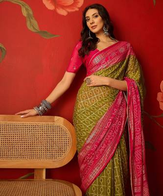 Green georgette bandhni printed saree with unstitched blouse piece. 1