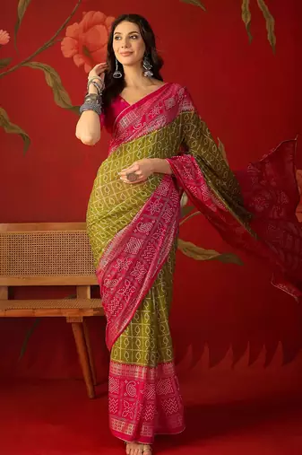 Green georgette bandhni printed saree with unstitched blouse piece.