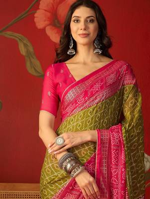 Green georgette bandhni printed saree with unstitched blouse piece. 3