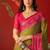 Green georgette bandhni printed saree with unstitched blouse piece.