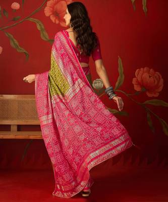 Green georgette bandhni printed saree with unstitched blouse piece. 4
