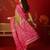Green georgette bandhni printed saree with unstitched blouse piece.